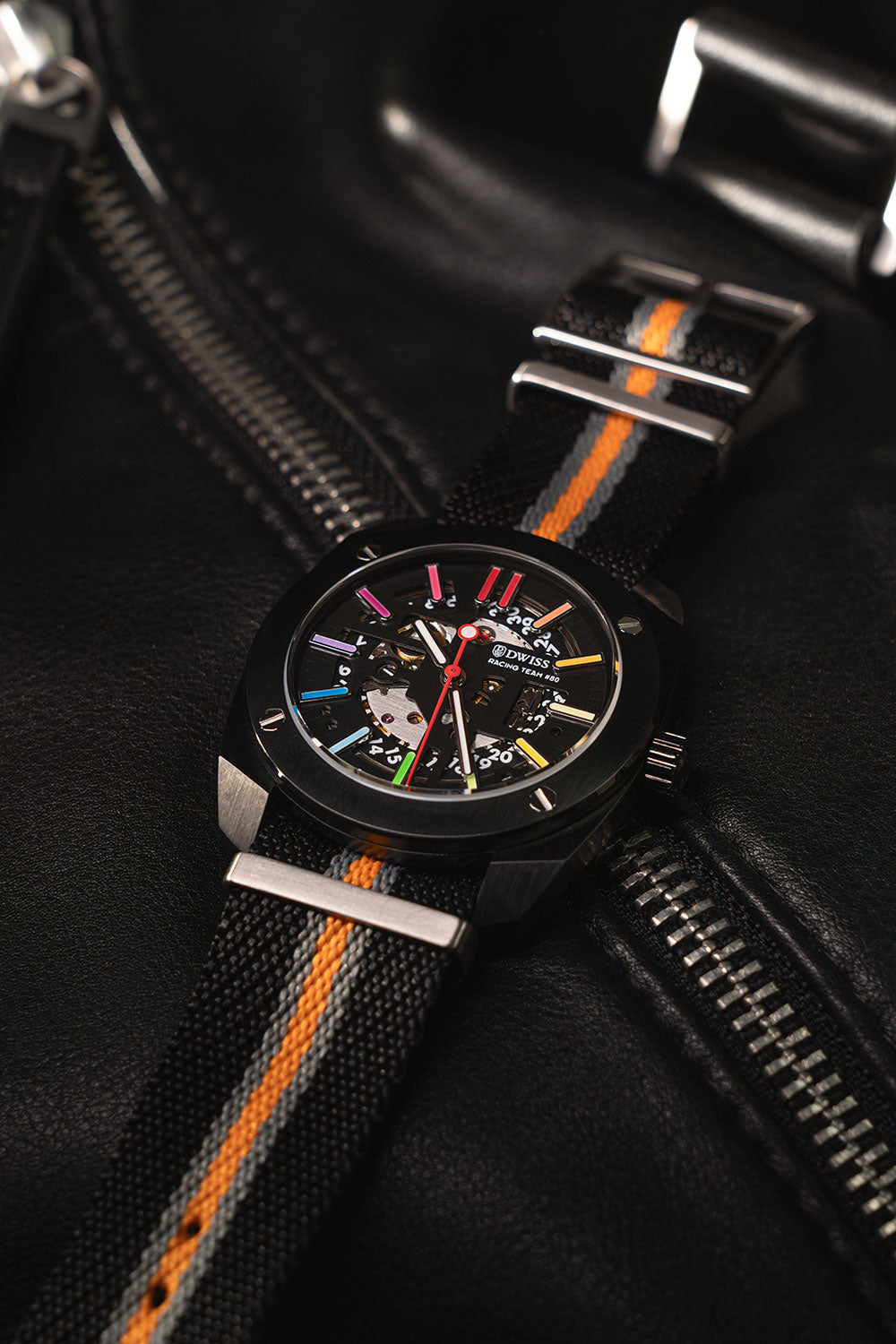 lifestyle picture RT#80 Racing team 80, swiss made watch using Peseux F324 automatic movement with metal bracelet, Exclusive rainbow Swiss Super-LumiNova® nato strap